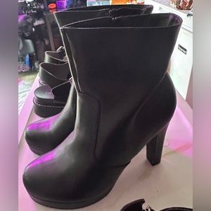 Torrid black heel boots. New no tags. Size 10 women’s.